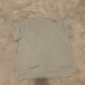 Mint green lululemon short sleeve top; size 8